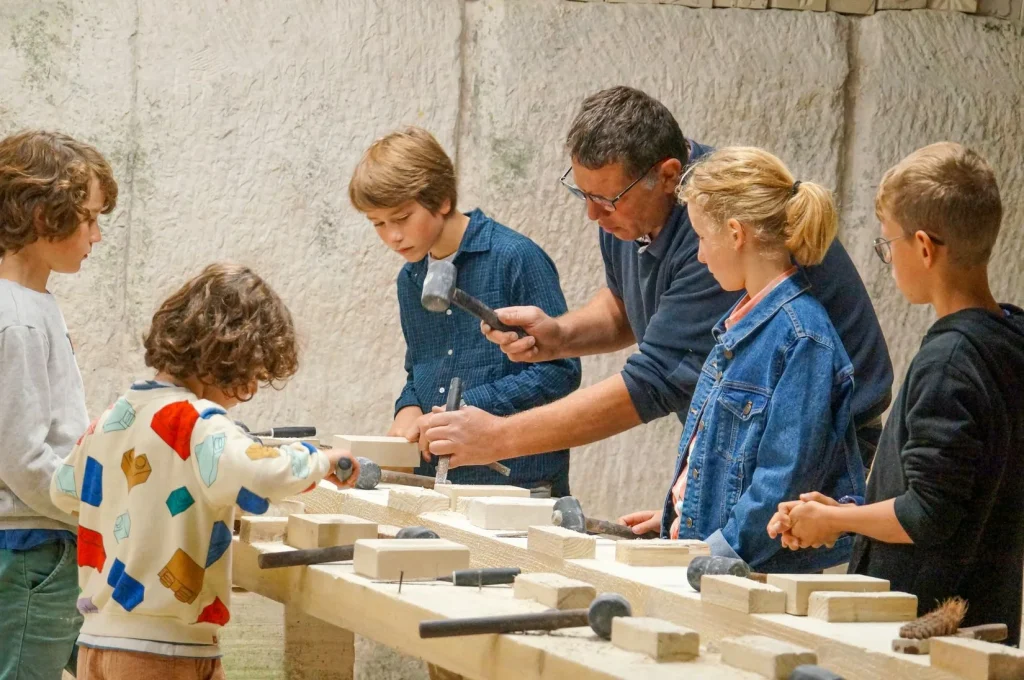 With family at the stone cutting workshop at the Aubigny quarry