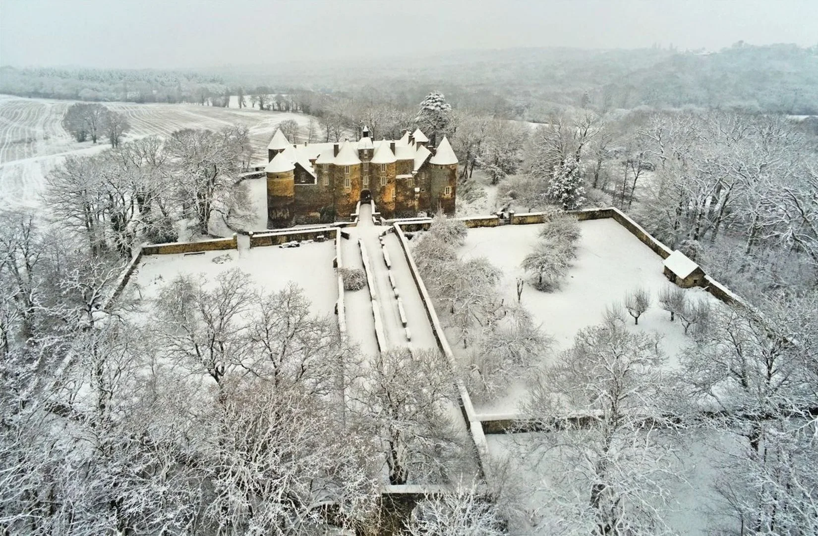 The Château de Ratilly under the snow in Treigny