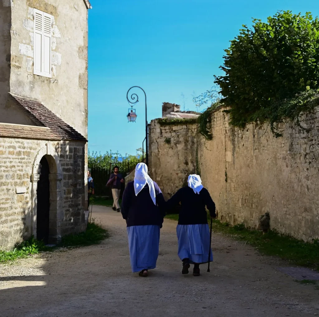 Nuns walking towards the Basilica of Sainte-Marie-Madeleine