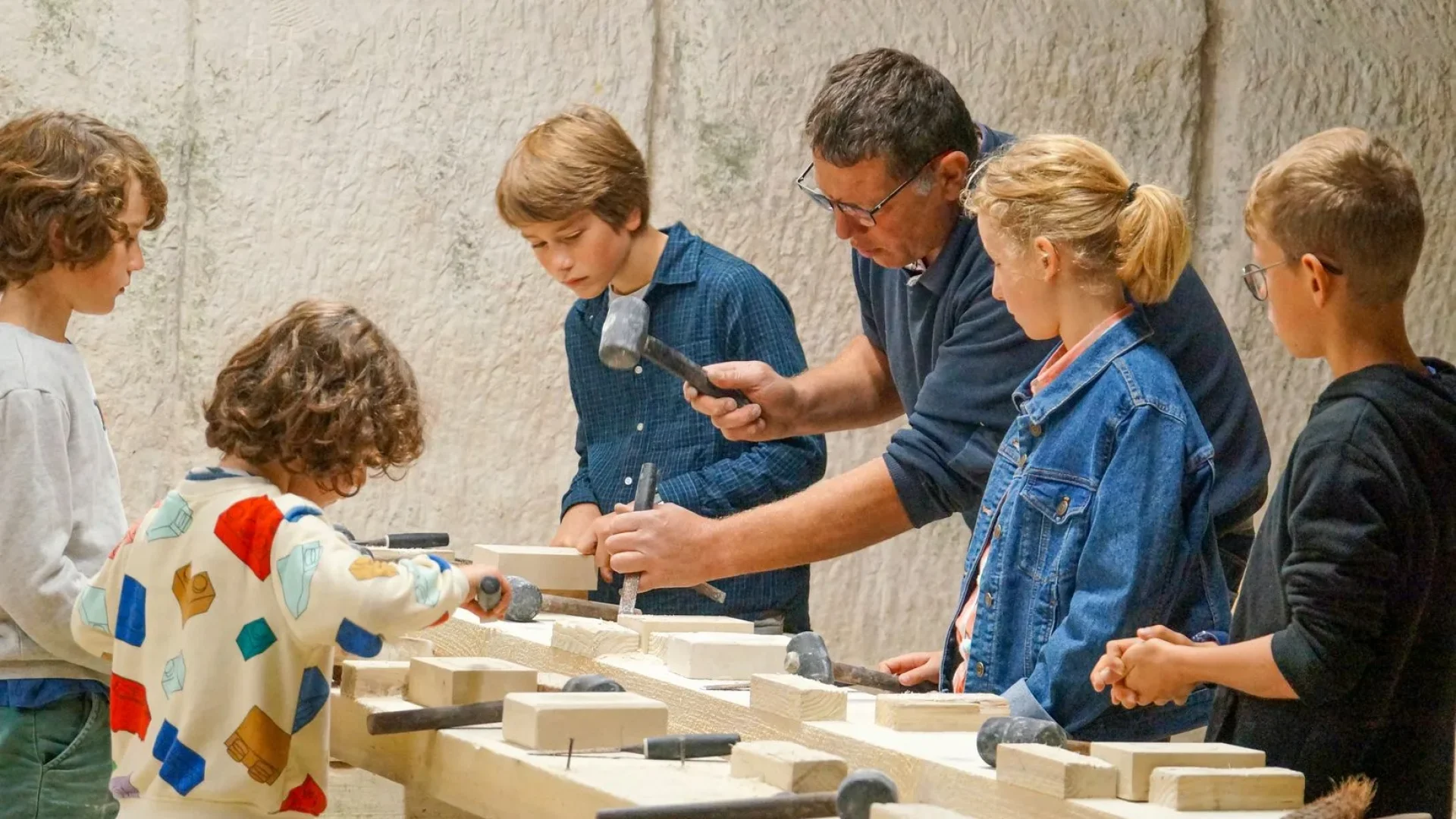 With family at the stone cutting workshop at the Aubigny quarry