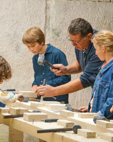 With family at the stone cutting workshop at the Aubigny quarry