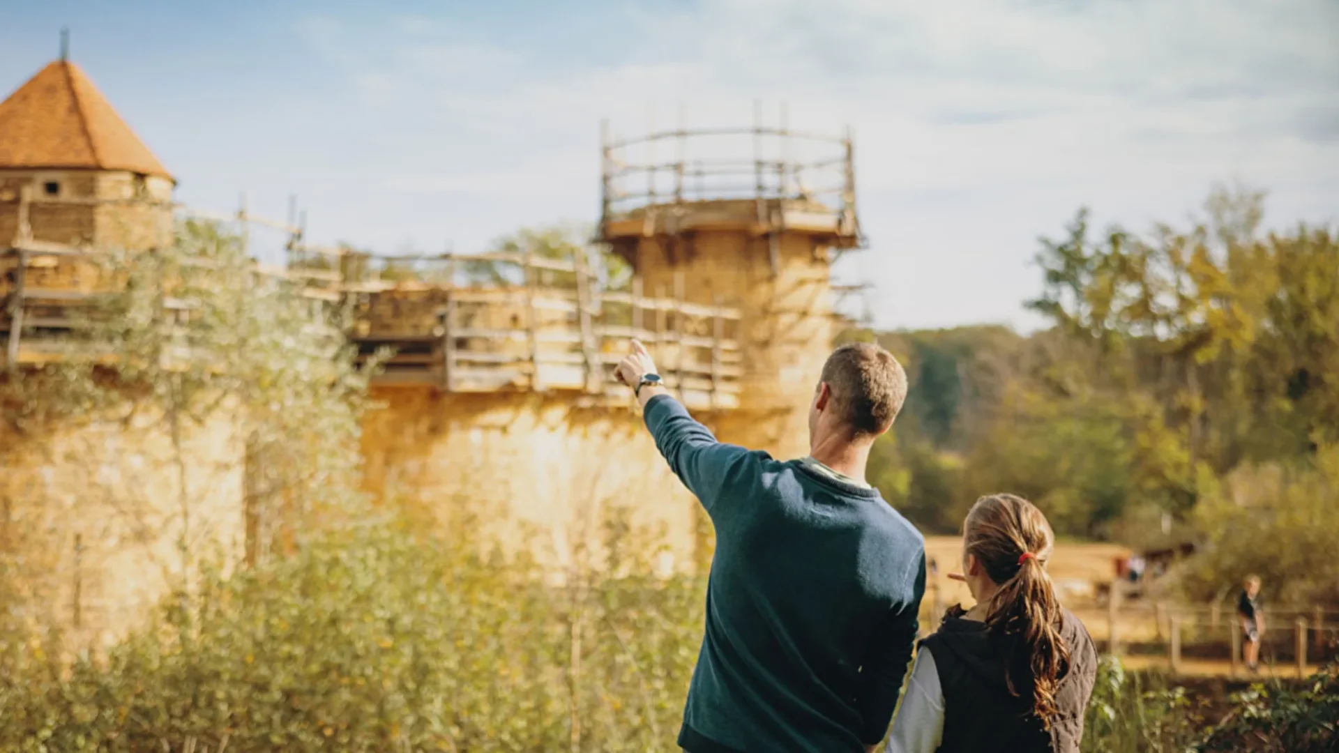 View of the medieval construction site of Guedelon for a family of visitors